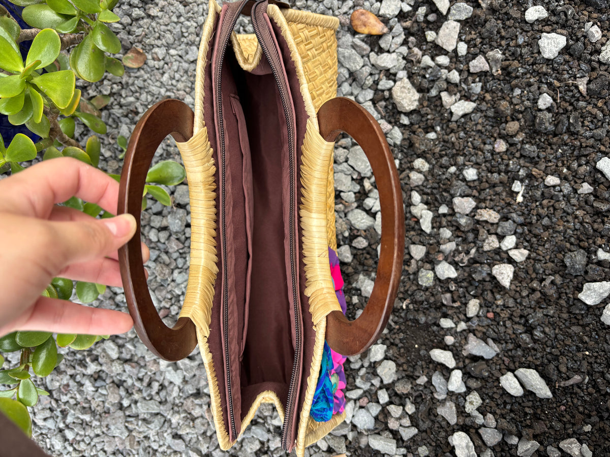Lauhala Pua ‘Eke Trapeze Handbag - purple, turquoise, and magenta