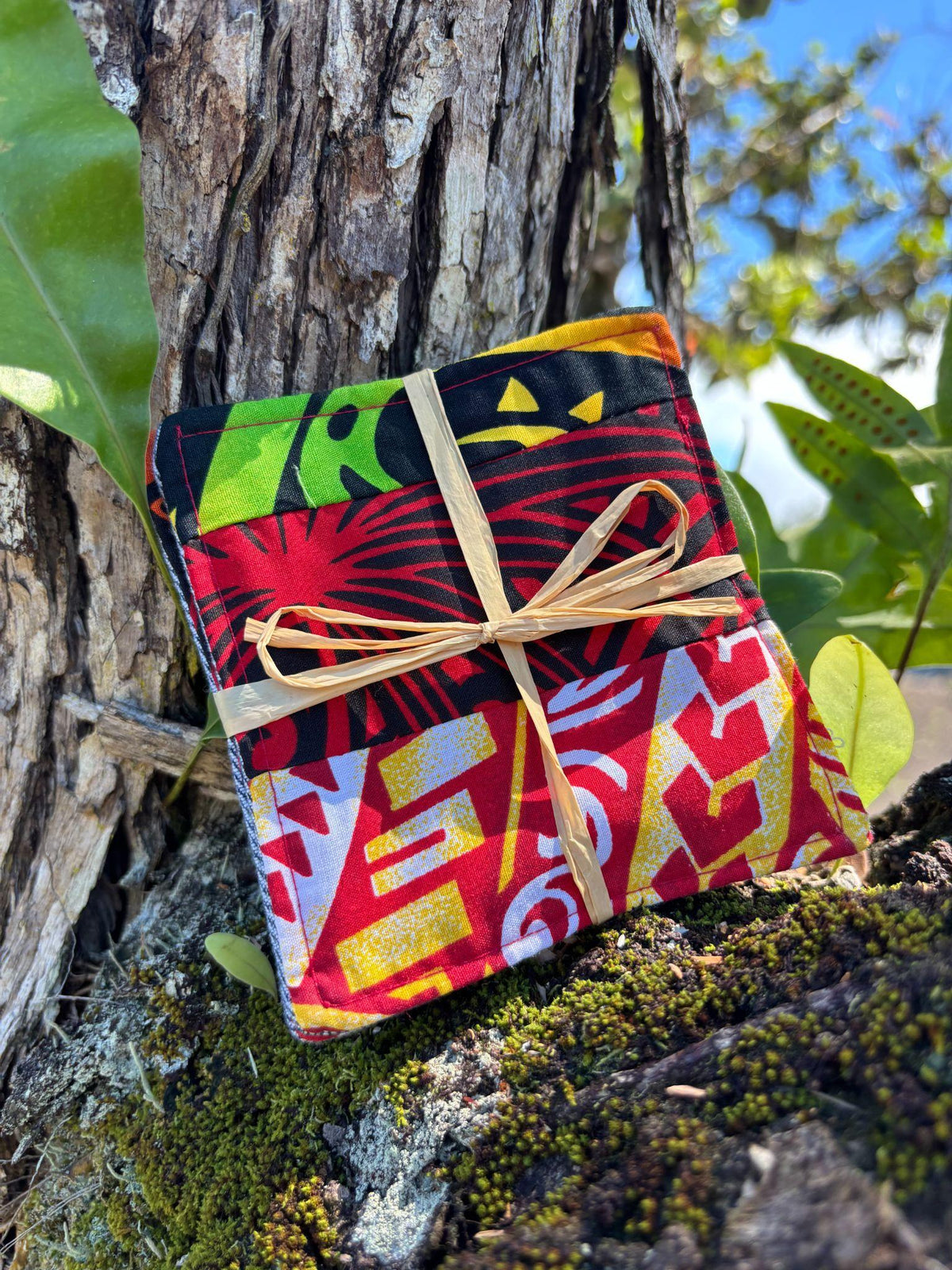 Medium Hand-sewn 2 Piece Coaster - Set 11, pattern 11B: fabric side tied with a lauhala twine bow