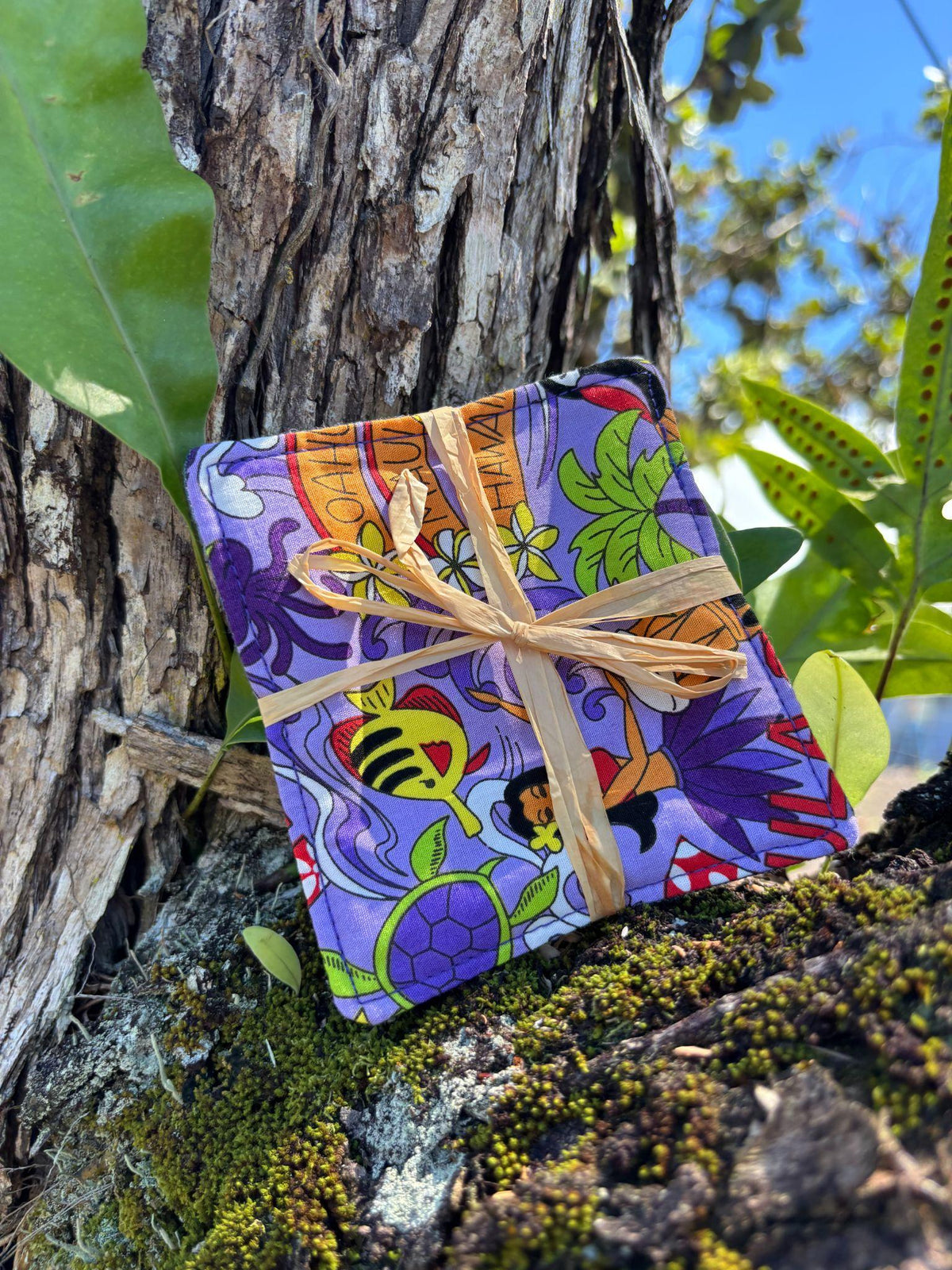 Medium Hand-sewn 2 Piece Coaster - Set 12, pattern 12A: fabric side tied with a lauhala twine bow