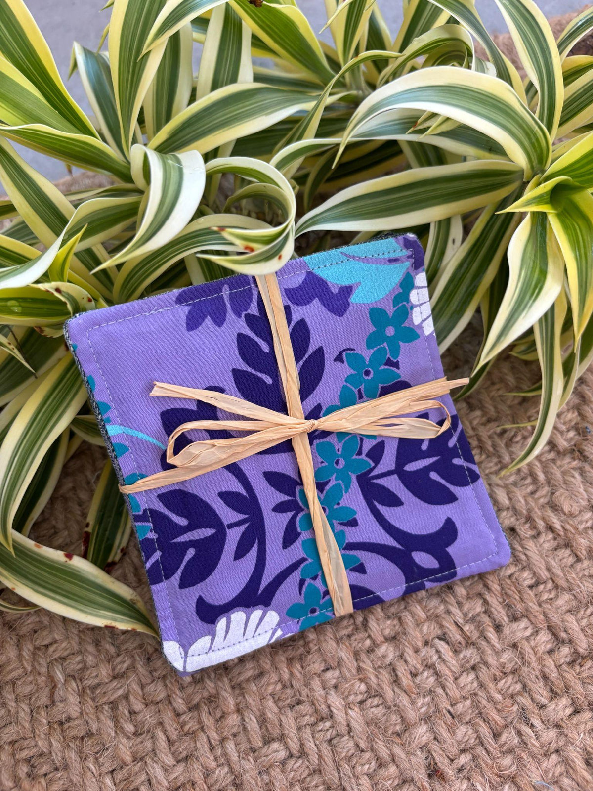 Medium Hand-sewn 2 Piece Coaster - Set 16, pattern 16B: fabric side tied with a lauhala twine bow
