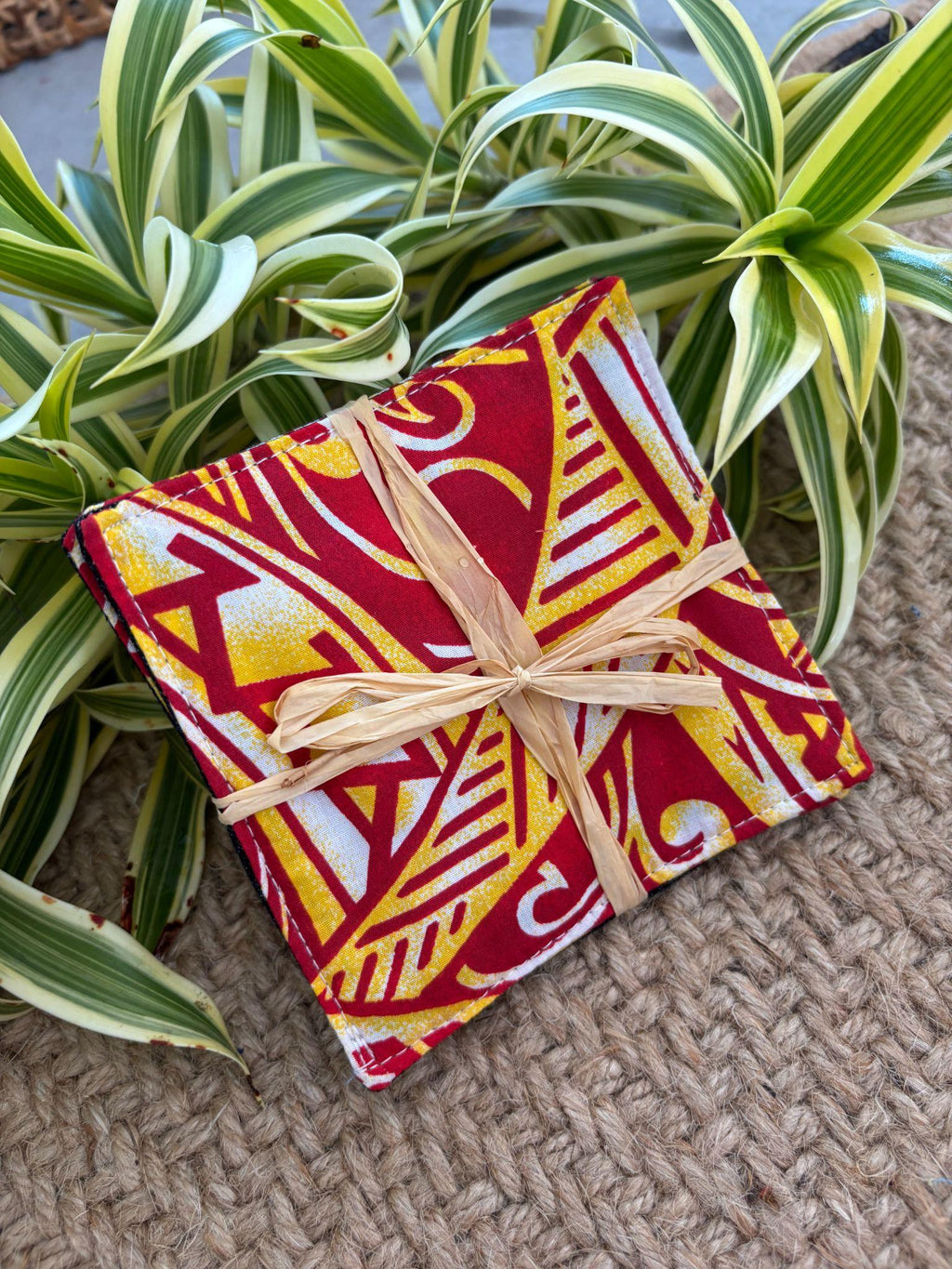 Medium Hand-sewn 2 Piece Coaster - Set 17, pattern 17A: fabric side tied with a lauhala twine bow