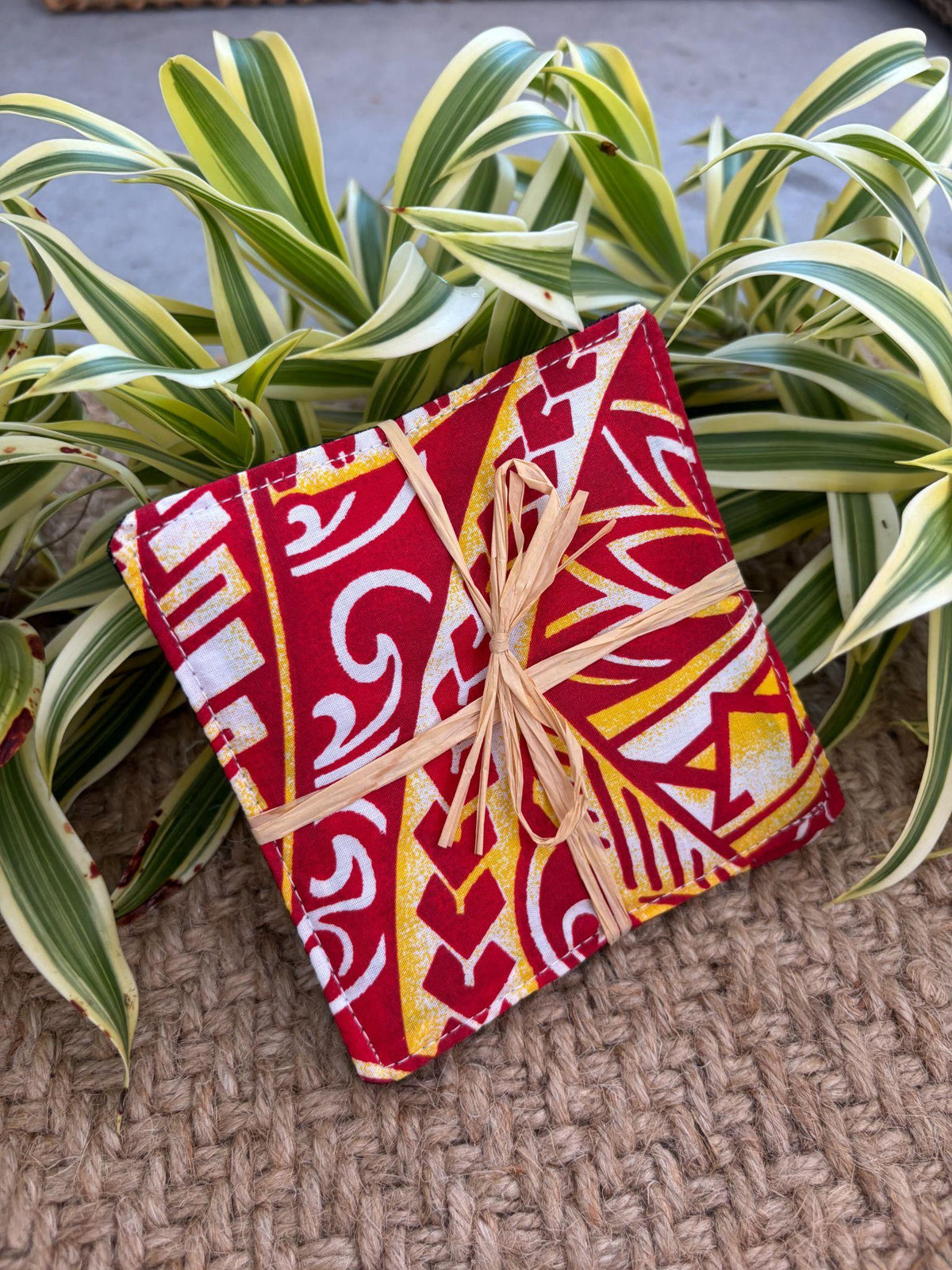 Medium Hand-sewn 2 Piece Coaster - Set 17, pattern 17C: fabric side tied with a lauhala twine bow