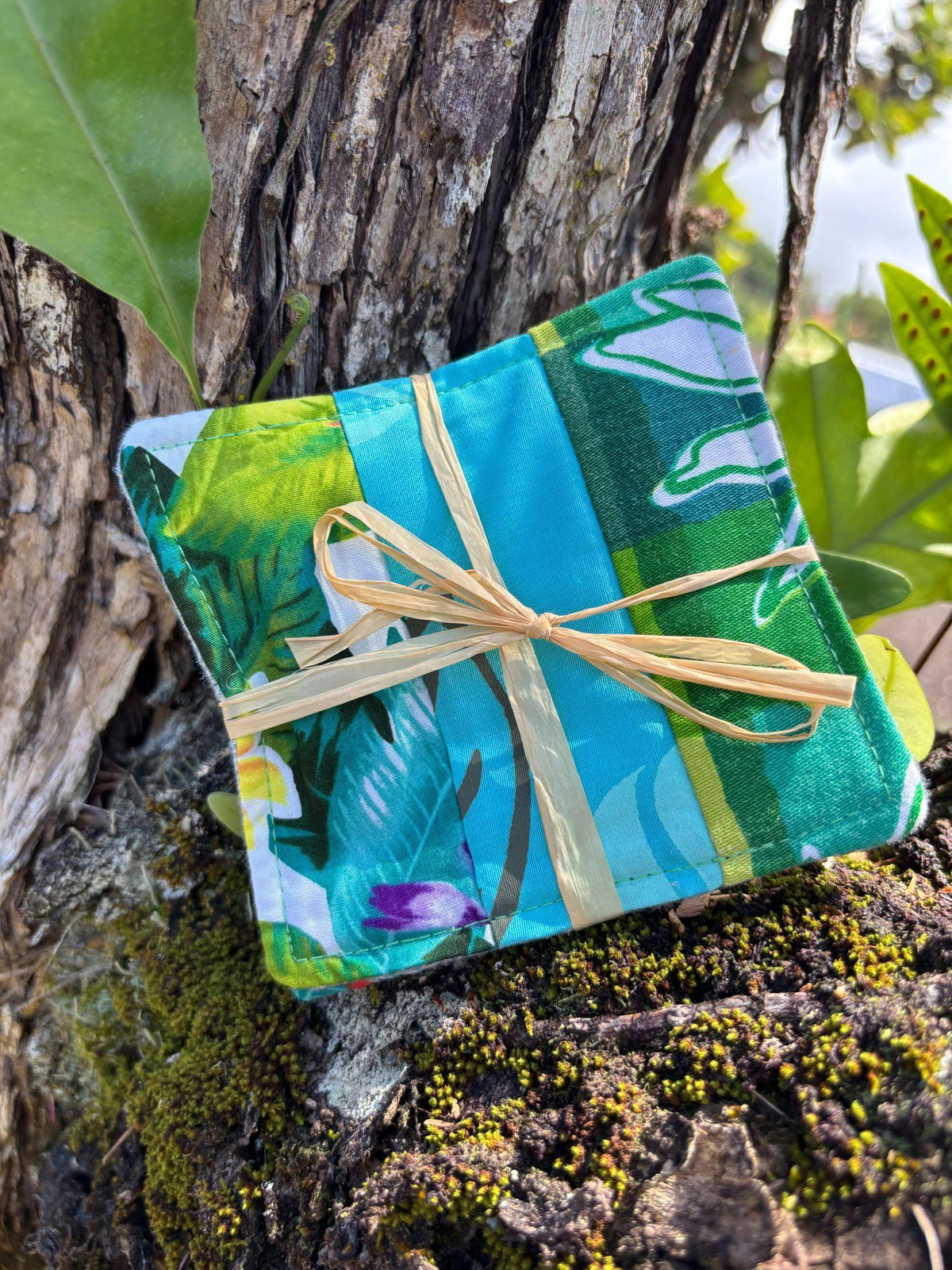 Medium Hand-sewn 2 Piece Coaster - Set 1, pattern 1D: fabric side tied with a lauhala twine bow