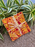 Medium Hand-sewn 2 Piece Coaster - Set 22, pattern 22A: fabric side tied with a lauhala twine bow