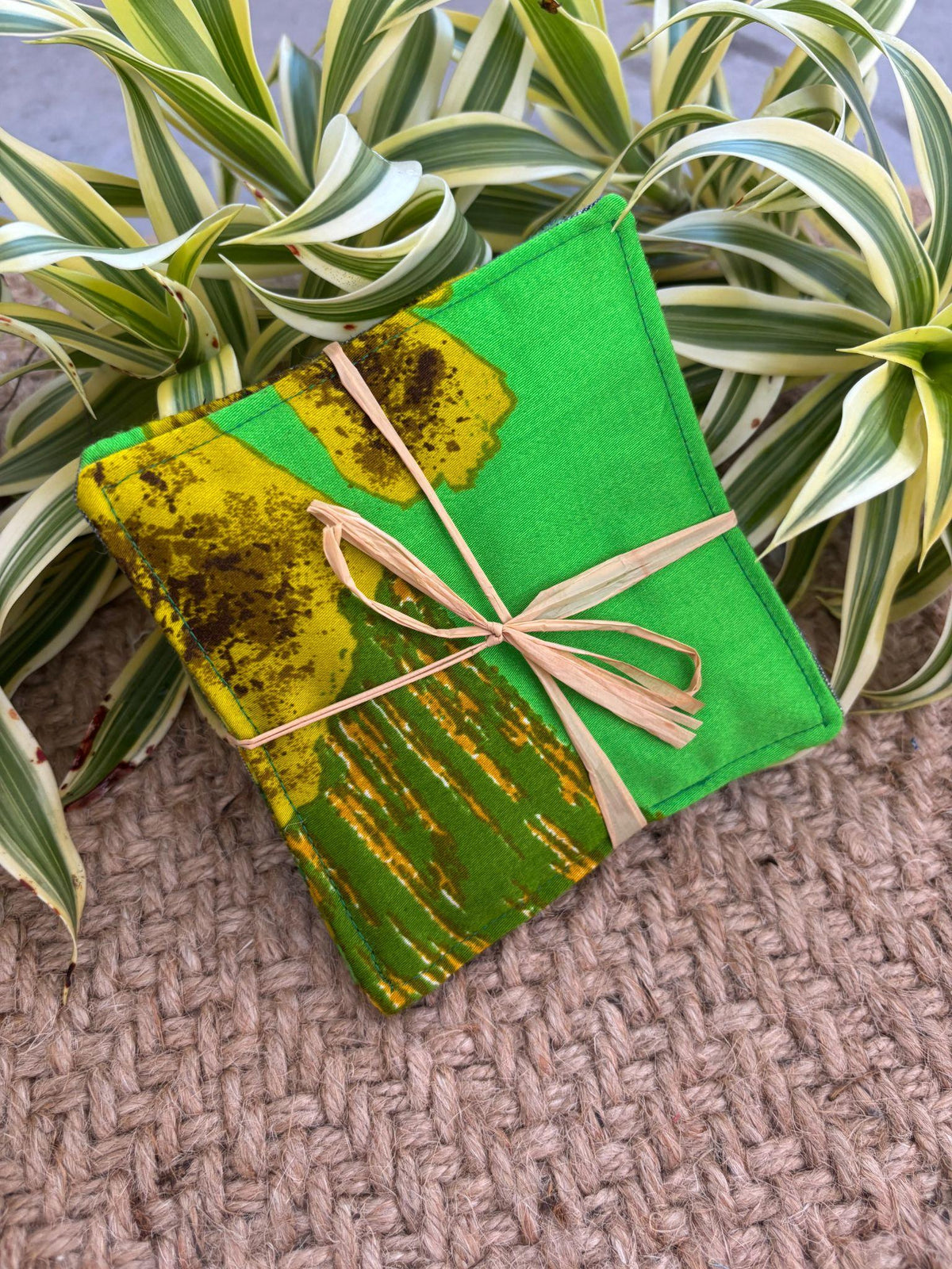Medium Hand-sewn 2 Piece Coaster - Set 23, pattern 23A: fabric side tied with a lauhala twine bow