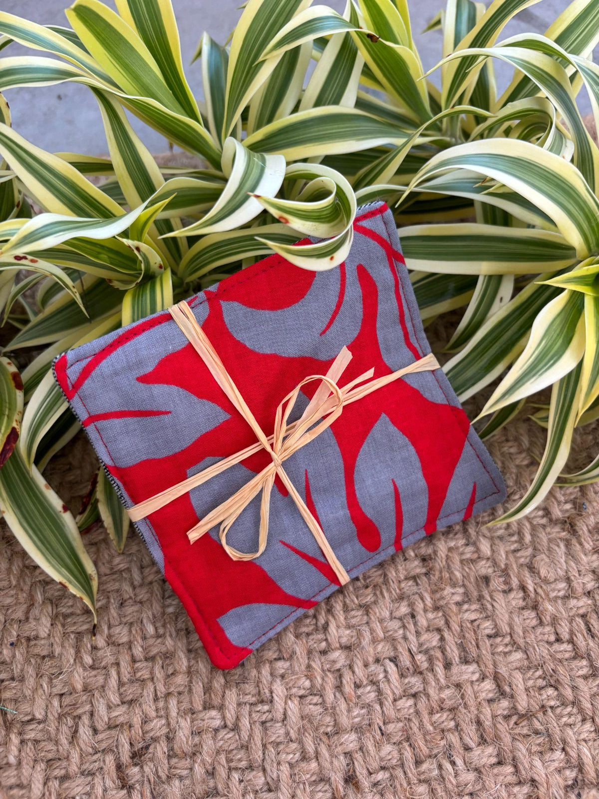 Medium Hand-sewn 2 Piece Coaster - Set 25, pattern 25A: fabric side tied with a lauhala twine bow