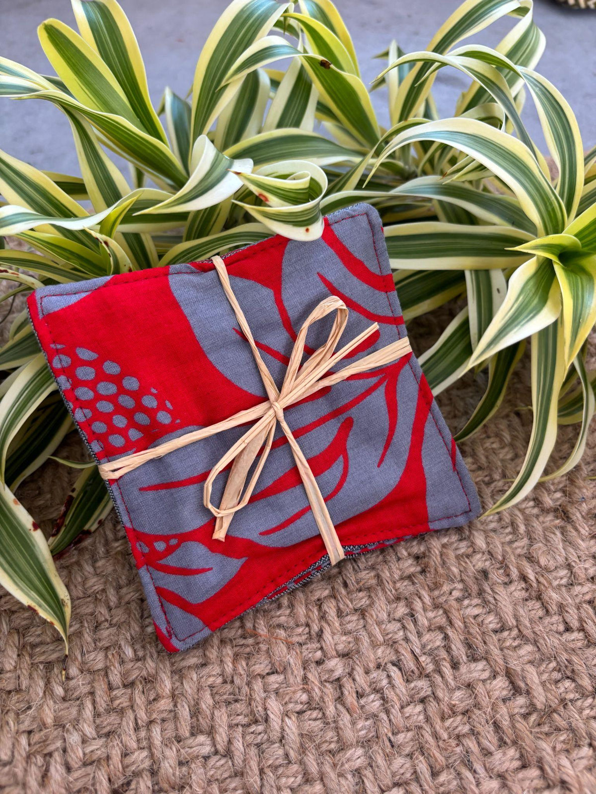 Medium Hand-sewn 2 Piece Coaster - Set 25, pattern 25B: fabric side tied with a lauhala twine bow