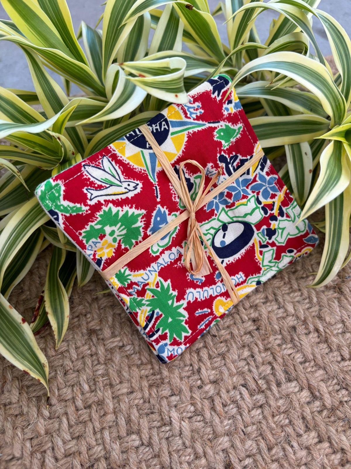 Medium Hand-sewn 2 Piece Coaster - Set 28, pattern 28A: fabric side tied with a lauhala twine bow