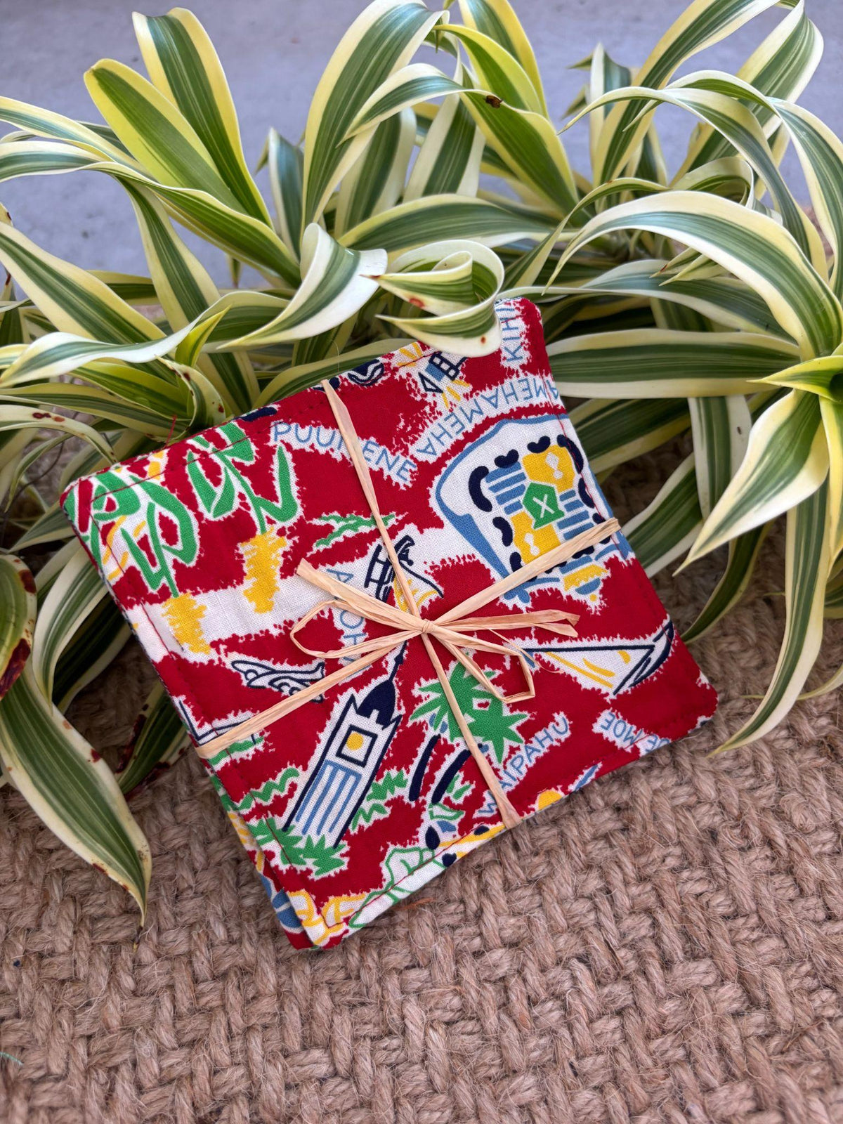 Medium Hand-sewn 2 Piece Coaster - Set 28, pattern 28B: fabric side tied with a lauhala twine bow
