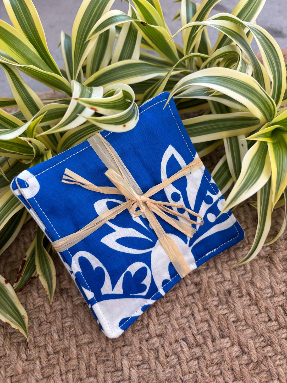 Medium Hand-sewn 2 Piece Coaster - Set 30, pattern 30A: fabric side tied with a lauhala twine bow