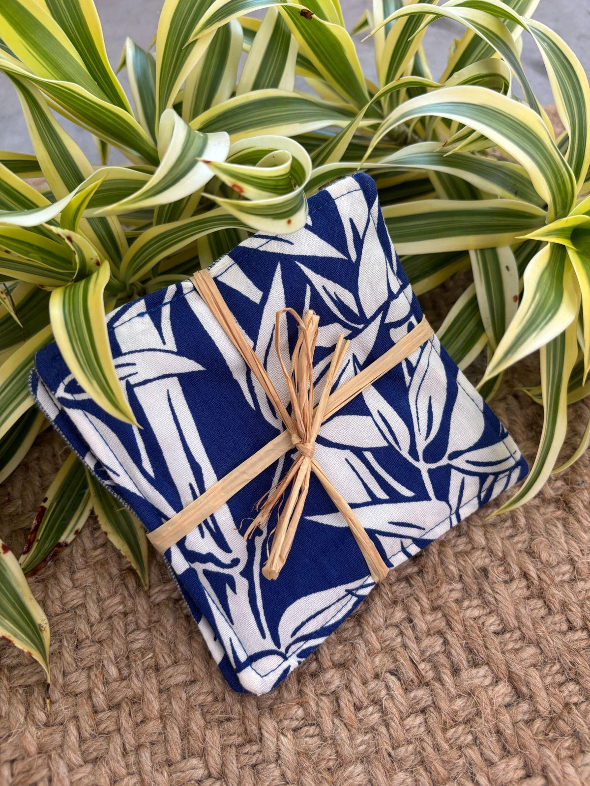 Medium Hand-sewn 2 Piece Coaster - Set 31, pattern 31A: fabric side tied with a lauhala twine bow