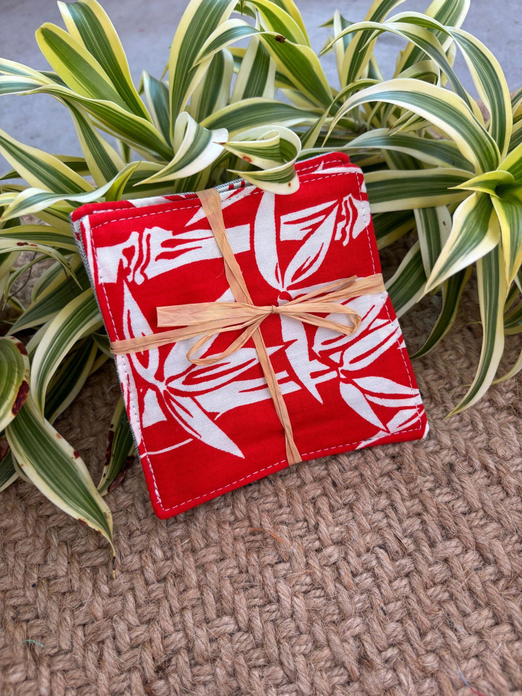 Medium Hand-sewn 2 Piece Coaster - Set 32, pattern 32A: fabric side tied with a lauhala twine bow
