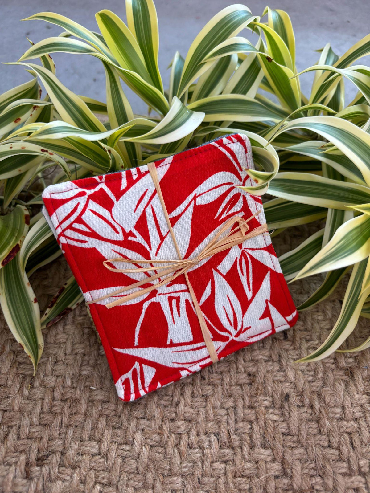 Medium Hand-sewn 2 Piece Coaster - Set 32, pattern 32B: fabric side tied with a lauhala twine bow