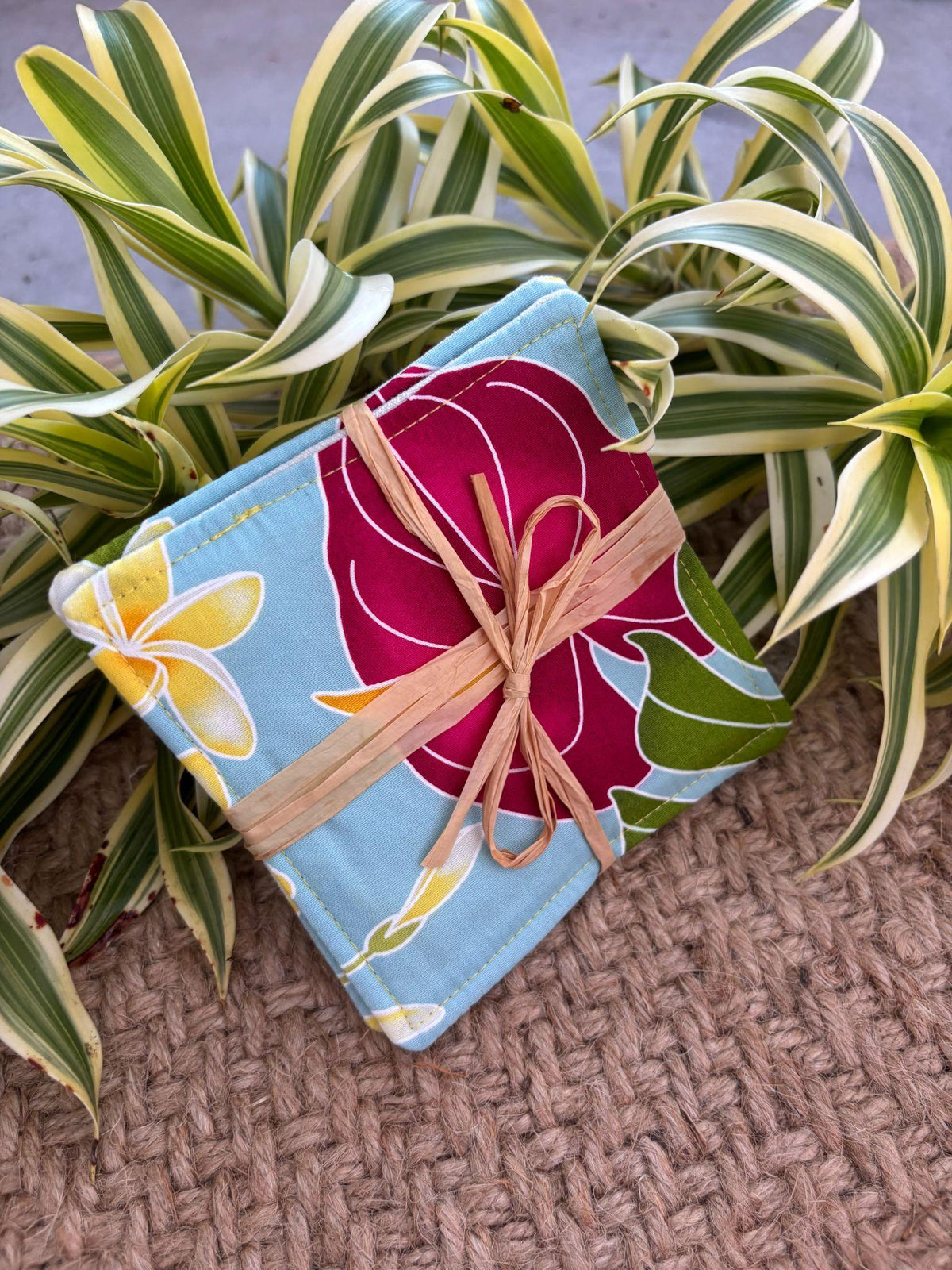 Medium Hand-sewn 2 Piece Coaster - Set 35, pattern 35A: fabric side tied with a lauhala twine bow
