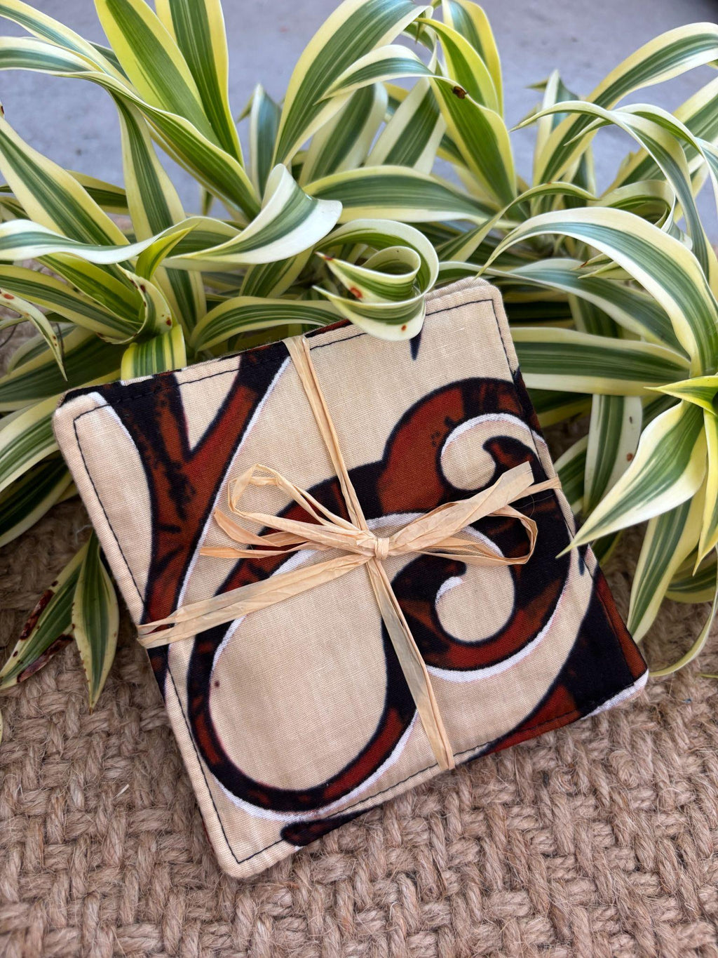 Medium Hand-sewn 2 Piece Coaster - Set 39, pattern 39A: fabric side tied with a lauhala twine bow