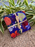 Medium Hand-sewn 2 Piece Coaster - Set 41, pattern 41A: fabric side tied with a lauhala twine bow
