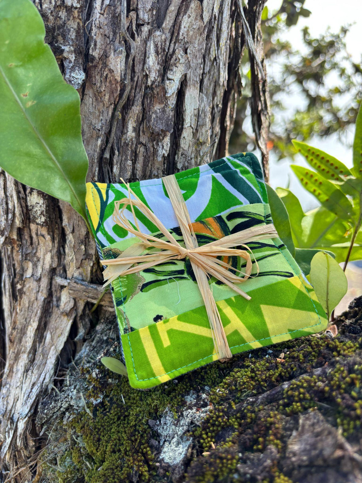 Medium Hand-sewn 2 Piece Coaster - Set 5, pattern 5A: fabric side tied with a lauhala twine bow