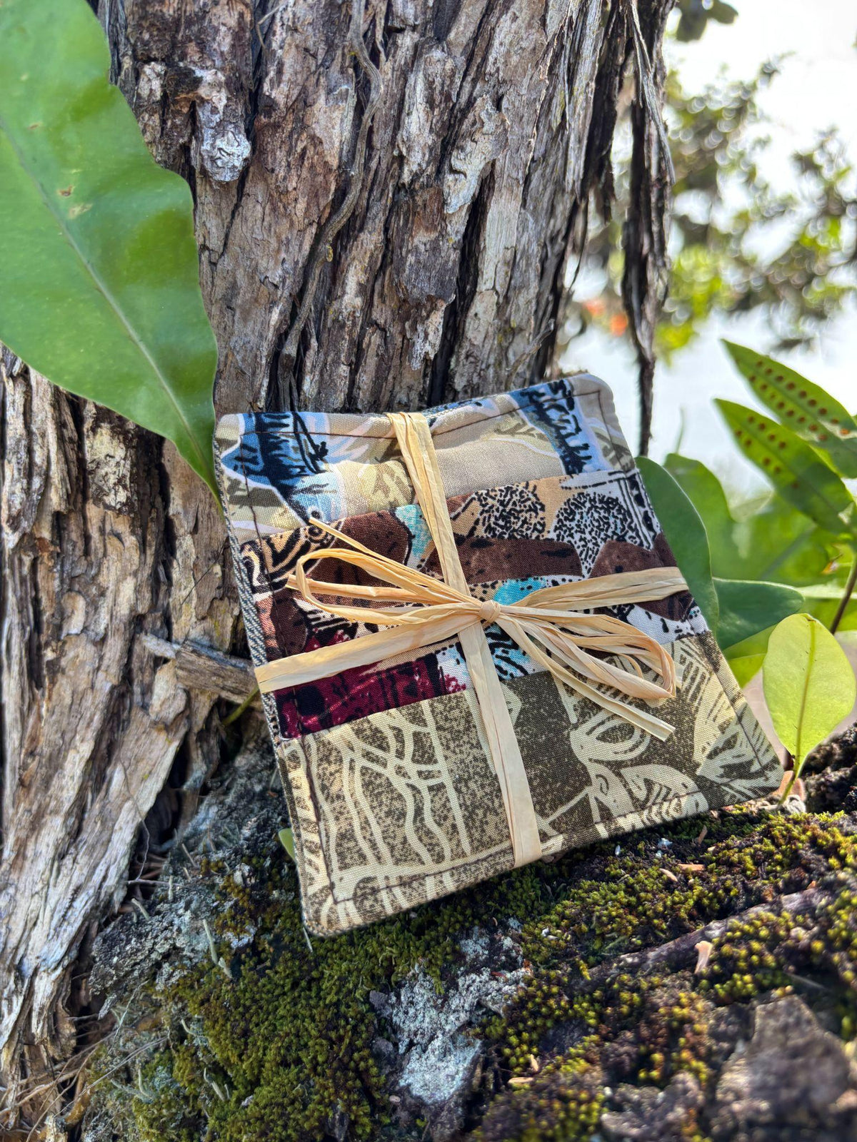 Medium Hand-sewn 2 Piece Coaster - Set 6, pattern 6D: fabric side tied with a lauhala twine bow