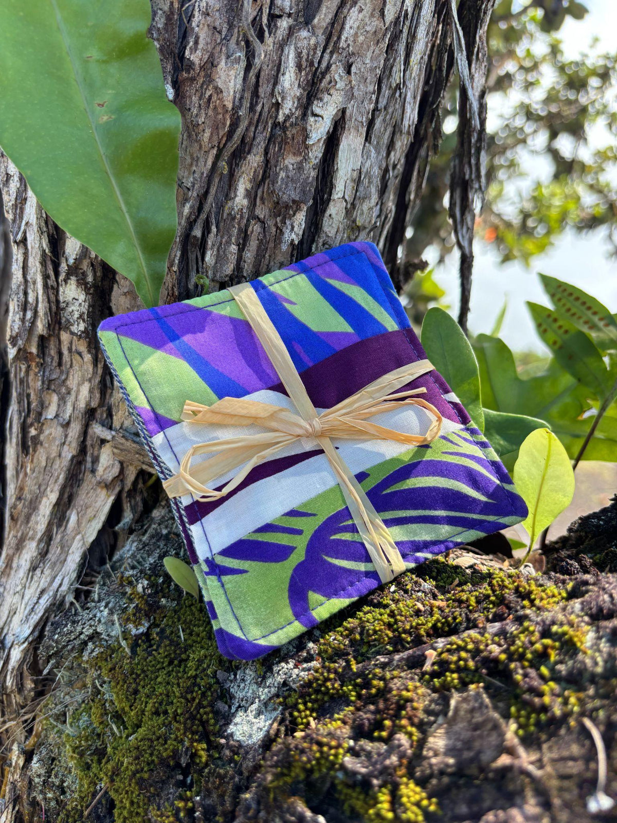 Medium Hand-sewn 2 Piece Coaster - Set 7, pattern 7B: fabric side tied with a lauhala twine bow